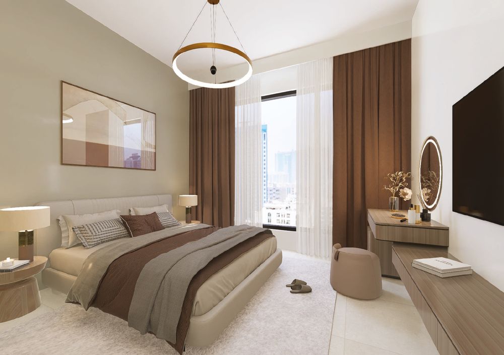 Furnished bedroom with window and dressing table, Al Ameera Village brochure image