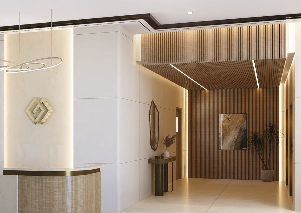 Lobby reception desk and lift corridor, Al Ameera Village brochure image