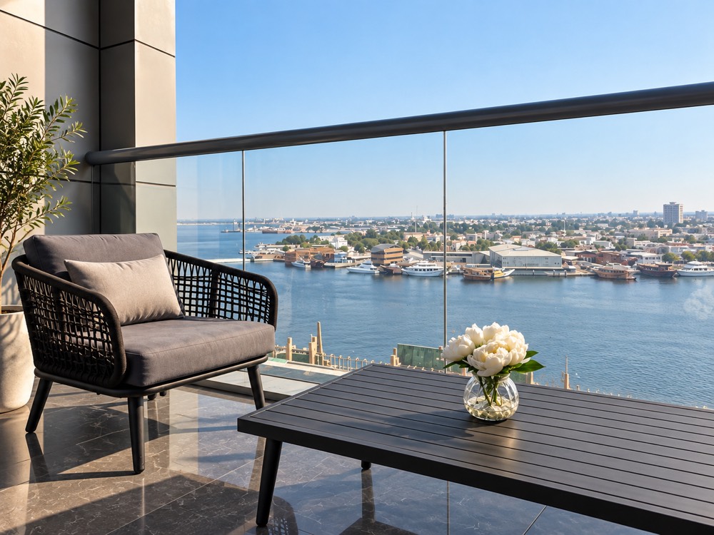 Two-bedroom apartment terrace with creek views at Ajman Creek Towers (developer render)